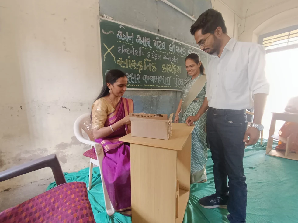 Participants acting out a consultation as part of a classroom health education roleplay